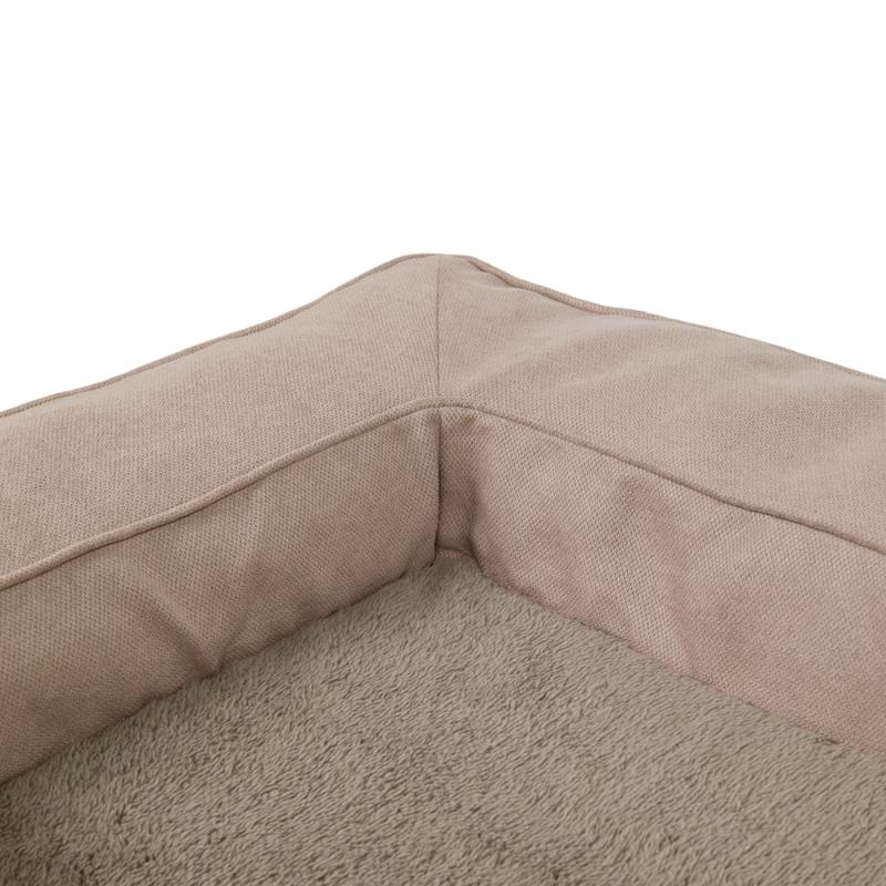 Close-up van de rand en de pluizige ligplek van het Action hondenkussen met memory foam